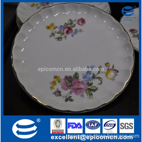 a floral design, scalloped edge, and gold rim composed Set of 6 marked porcelain dessert/salad plates